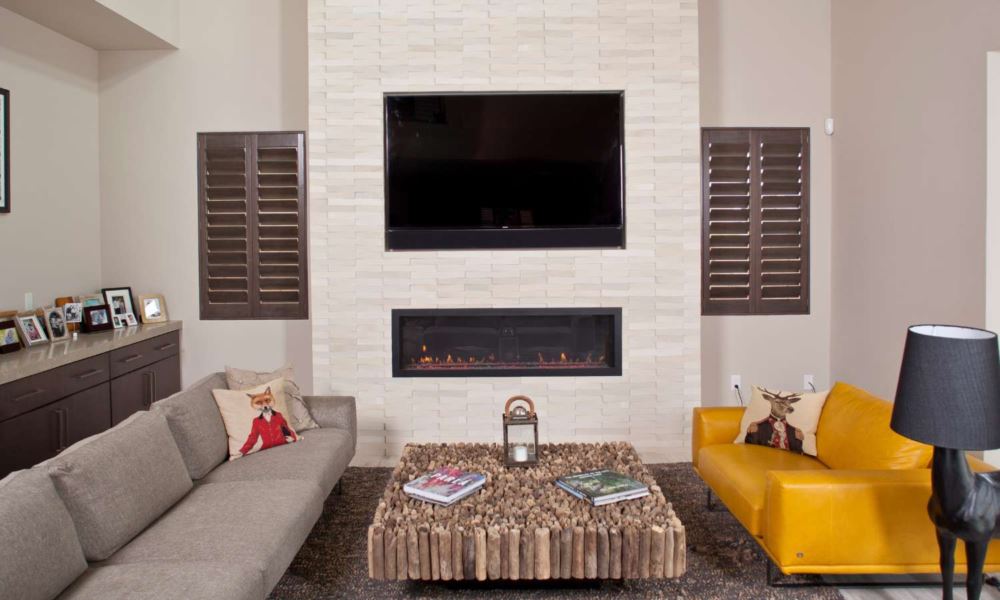 Ovation wood shutters around fireplace